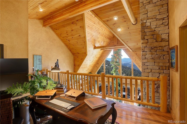11450 Marks Dr, Conifer, CO 80433 - office area featuring wooden ceiling with exposed beams, wood finished floors, high vaulted ceiling, and a mountain view