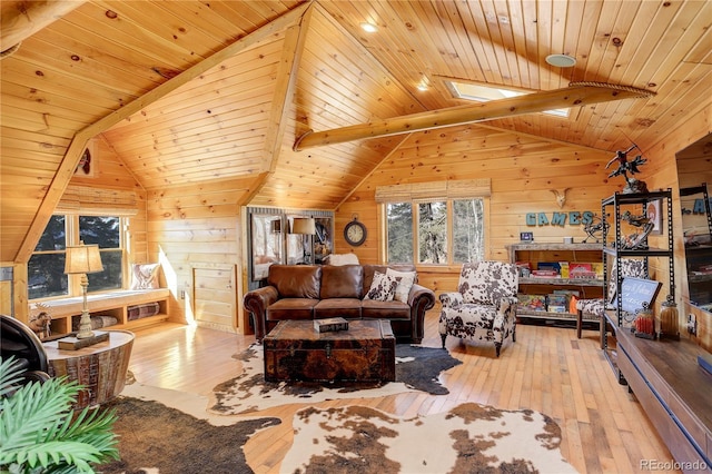 11450 Marks Dr, Conifer, CO 80433 - living room featuring wood-type flooring, wood walls, wooden ceiling, and a skylight