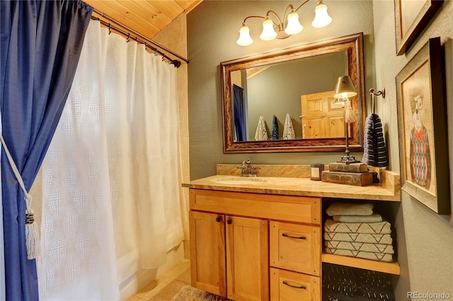 11450 Marks Dr, Conifer, CO 80433 - full bathroom featuring vanity and a textured wall