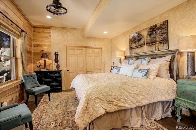 11450 Marks Dr, Conifer, CO 80433 - bedroom featuring a closet, wood walls, and recessed lighting