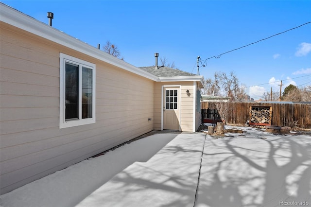 view of patio / terrace featuring fence