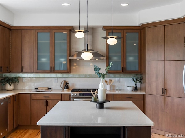 10057 S Shadow Hill Dr, Lone Tree, CO 80124 - kitchen with wall chimney exhaust hood, pendant lighting, stainless steel appliances, tasteful backsplash, and recessed lighting