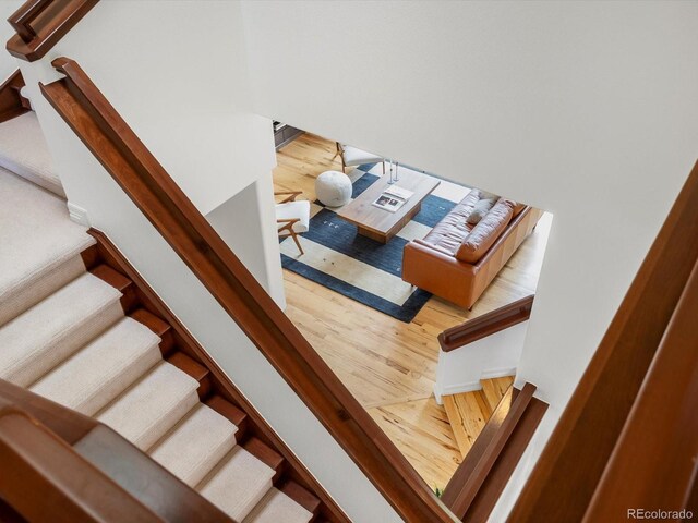 10057 S Shadow Hill Dr, Lone Tree, CO 80124 - staircase with wood finished floors