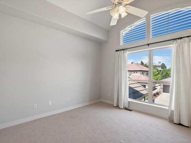 10057 S Shadow Hill Dr, Lone Tree, CO 80124 - spare room with carpet, ceiling fan, baseboards, and high vaulted ceiling