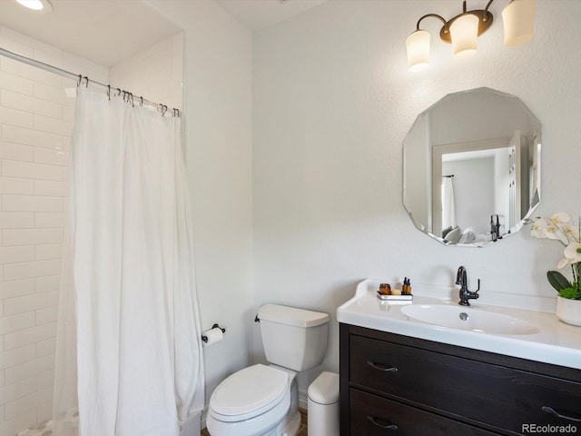 10057 S Shadow Hill Dr, Lone Tree, CO 80124 - bathroom featuring vanity, toilet, and a tile shower
