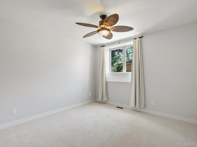 10057 S Shadow Hill Dr, Lone Tree, CO 80124 - unfurnished room with a ceiling fan, light carpet, and baseboards