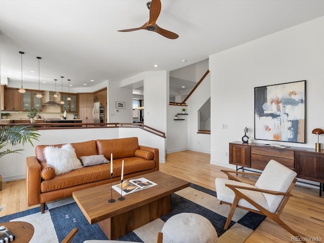 10057 S Shadow Hill Dr, Lone Tree, CO 80124 - living room with light wood-style floors, a ceiling fan, recessed lighting, and baseboards