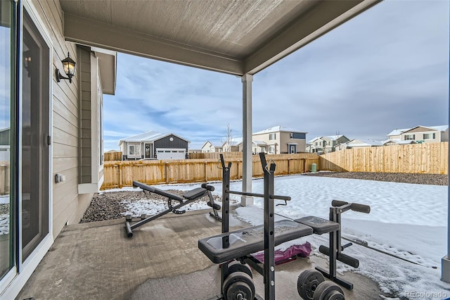 view of snow covered patio