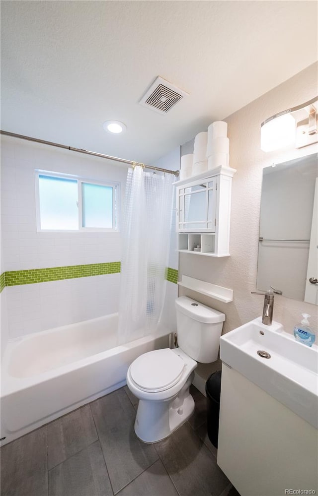 bathroom with toilet, shower / tub combo, wood finished floors, and vanity