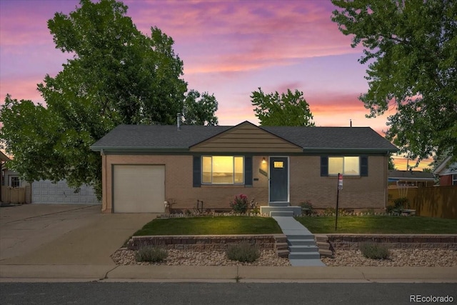 2069 E 116th Ave, Northglenn, CO 80233 - single story home with driveway and a garage
