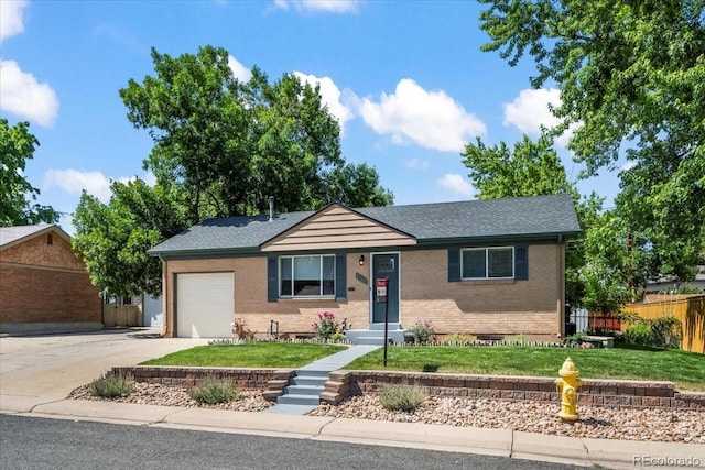 2069 E 116th Ave, Northglenn, CO 80233 - ranch-style house featuring an attached garage, brick siding, driveway, and a shingled roof