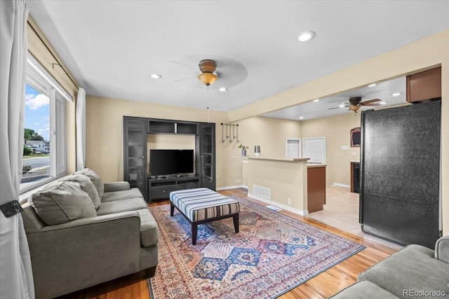 2069 E 116th Ave, Northglenn, CO 80233 - living room featuring ceiling fan, light wood-type flooring, and recessed lighting