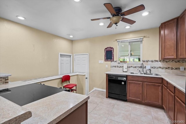 2069 E 116th Ave, Northglenn, CO 80233 - kitchen with black dishwasher, backsplash, ceiling fan, light countertops, and recessed lighting