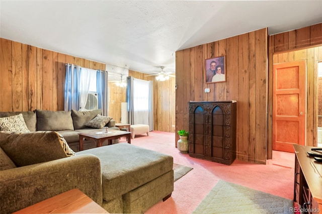 2732 W Archer Pl, Denver, CO 80219 - living room with light carpet, wooden walls, and a ceiling fan