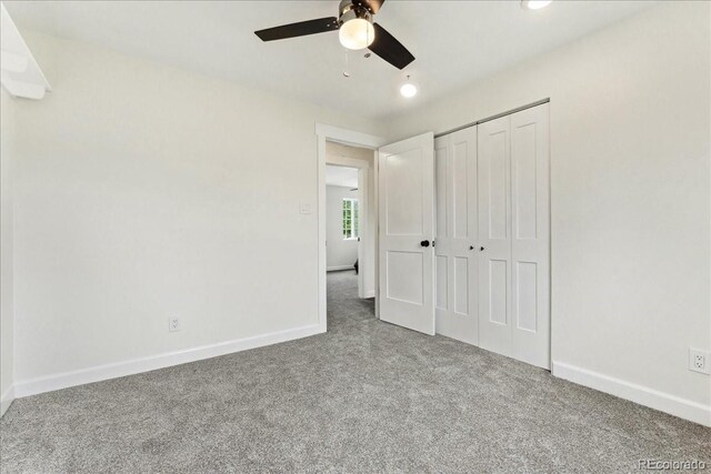 11021 Otis St, Westminster, CO 80020 - unfurnished bedroom featuring carpet floors, baseboards, a closet, and ceiling fan