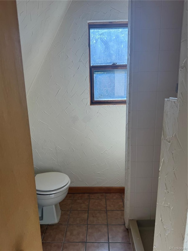 274 Lincoln Dr, Idaho Springs, CO 80452 - bathroom with tiled shower and tile patterned floors