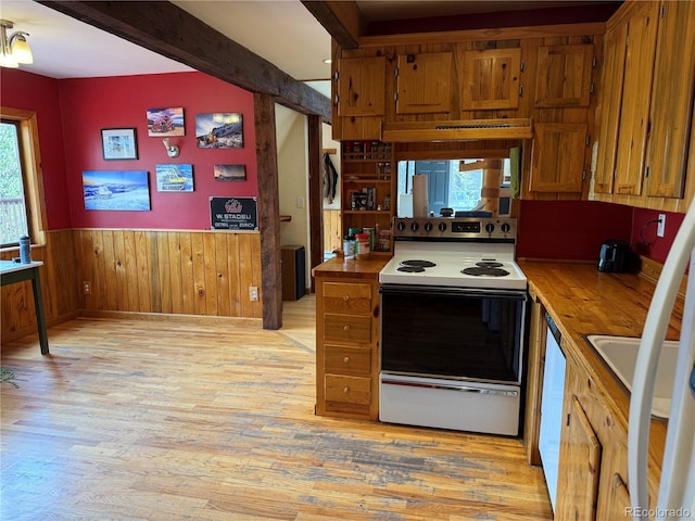274 Lincoln Dr, Idaho Springs, CO 80452 - kitchen featuring white electric stove, wainscoting, light wood-type flooring, brown cabinetry, and beam ceiling