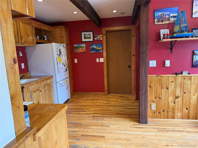 274 Lincoln Dr, Idaho Springs, CO 80452 - kitchen with freestanding refrigerator, light wood-style flooring, beamed ceiling, recessed lighting, and butcher block countertops
