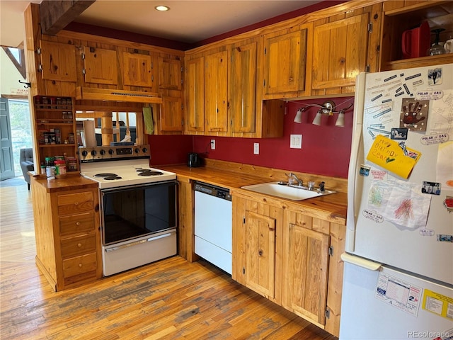 274 Lincoln Dr, Idaho Springs, CO 80452 - kitchen featuring white appliances, light wood-type flooring, brown cabinetry, recessed lighting, and open shelves