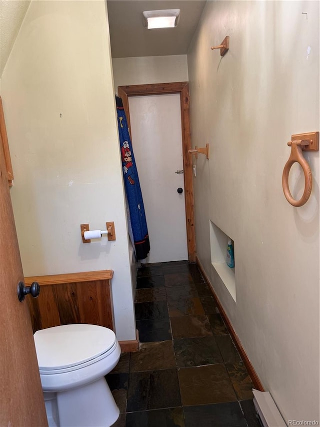 274 Lincoln Dr, Idaho Springs, CO 80452 - bathroom featuring stone tile floors and toilet
