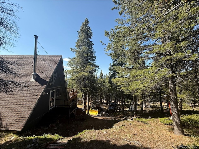 274 Lincoln Dr, Idaho Springs, CO 80452 - view of property exterior featuring a shingled roof