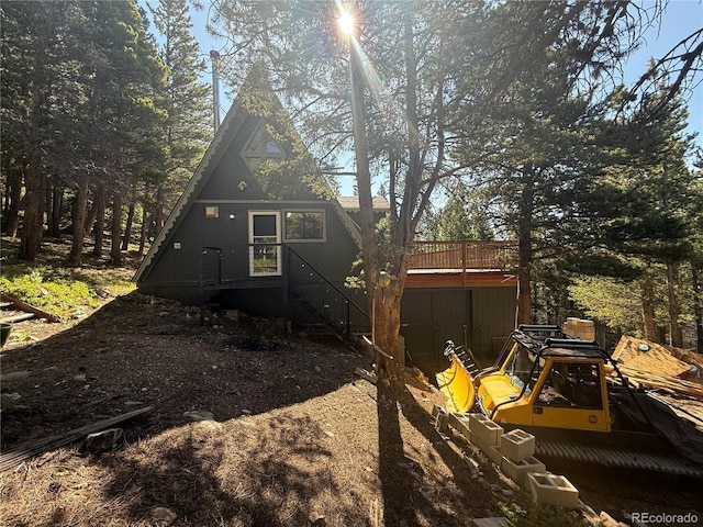 274 Lincoln Dr, Idaho Springs, CO 80452 - rear view of property with a deck and stairway