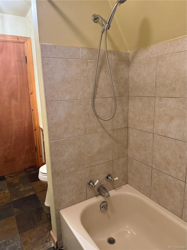 274 Lincoln Dr, Idaho Springs, CO 80452 - bathroom featuring shower / tub combination and stone finish floors