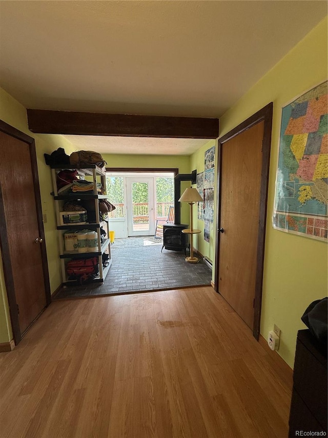 274 Lincoln Dr, Idaho Springs, CO 80452 - corridor featuring wood finished floors and beamed ceiling