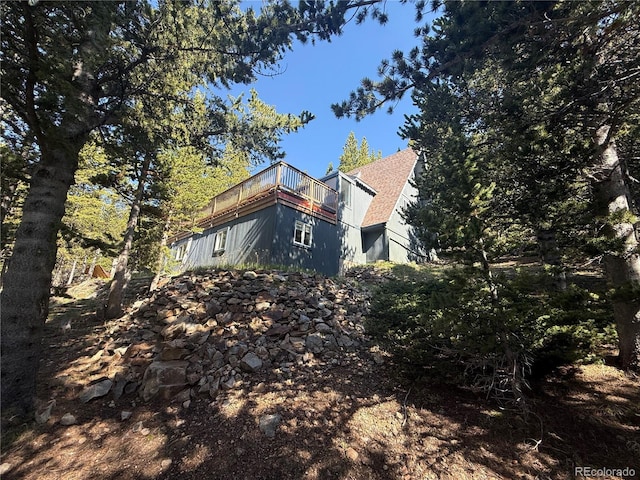274 Lincoln Dr, Idaho Springs, CO 80452 - view of side of home featuring a balcony and a shingled roof