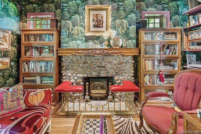 2324 S Columbine St, Denver, CO 80210 - living area featuring wallpapered walls and wood finished floors