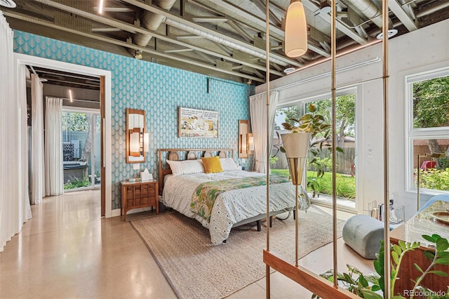 2324 S Columbine St, Denver, CO 80210 - bedroom featuring wallpapered walls, access to outside, and multiple windows