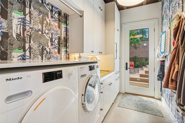 2324 S Columbine St, Denver, CO 80210 - washroom with washing machine and clothes dryer and cabinet space