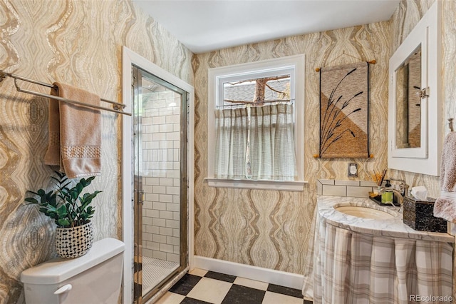 2324 S Columbine St, Denver, CO 80210 - full bath featuring tile patterned floors, vanity, toilet, and a stall shower