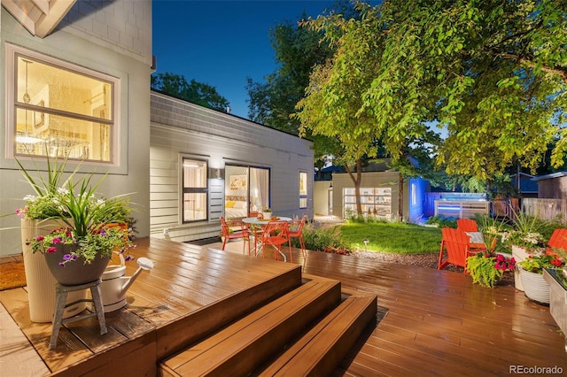 2324 S Columbine St, Denver, CO 80210 - deck at twilight featuring outdoor dining space and a jacuzzi