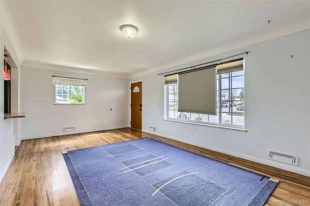 3600 Olive St, Denver, CO 80207 - interior space with baseboards and wood finished floors