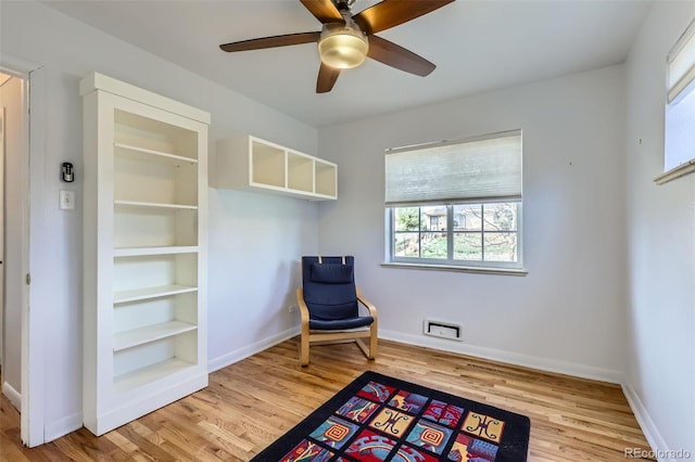 3600 Olive St, Denver, CO 80207 - unfurnished room with baseboards, ceiling fan, and wood finished floors