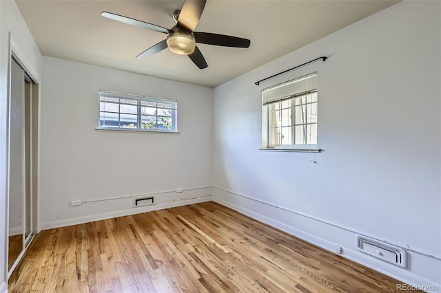 3600 Olive St, Denver, CO 80207 - empty room with a ceiling fan, baseboards, and light wood-style floors