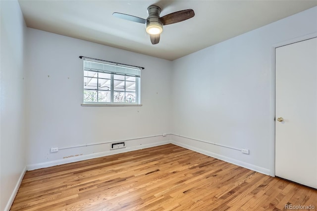 3600 Olive St, Denver, CO 80207 - unfurnished room with light wood-style floors, baseboards, and ceiling fan