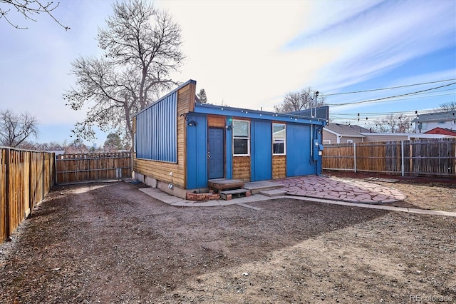 view of outdoor structure with a fenced backyard