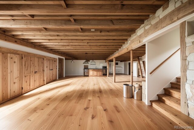 basement featuring light wood-type flooring