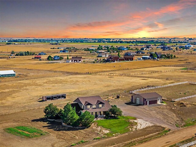 aerial view at dusk with a rural view