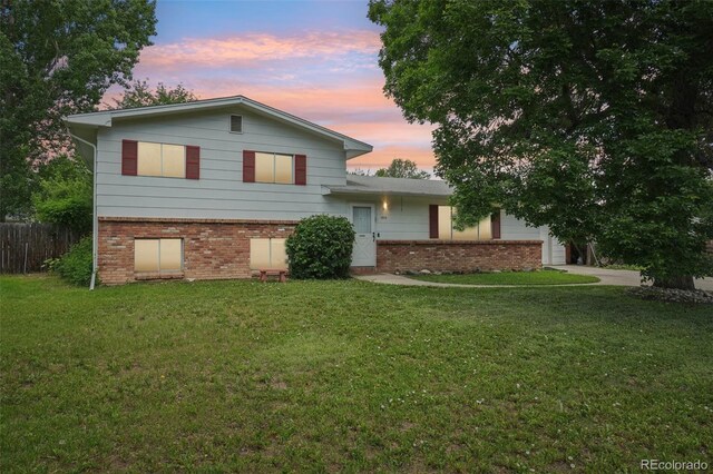 1213 S Taft Hill Rd, Fort Collins, CO 80521 - split level home with brick siding and an attached garage