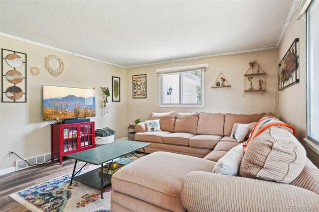 1213 S Taft Hill Rd, Fort Collins, CO 80521 - living area featuring wood finished floors, a textured ceiling, plenty of natural light, and crown molding