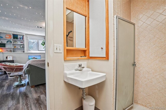 1213 S Taft Hill Rd, Fort Collins, CO 80521 - bathroom featuring wood finished floors and a shower stall