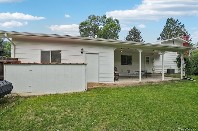 1213 S Taft Hill Rd, Fort Collins, CO 80521 - back of house featuring a lawn and a patio