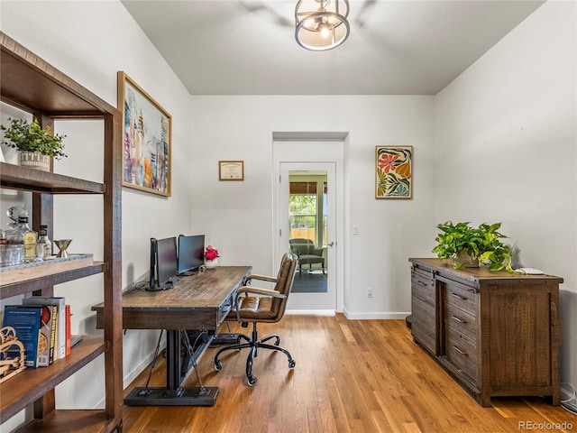4348 Umatilla St, Denver, CO 80211 - office featuring light wood-style flooring and baseboards