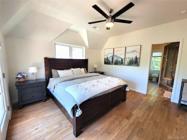 4348 Umatilla St, Denver, CO 80211 - bedroom with light wood-style flooring, vaulted ceiling, a ceiling fan, and ensuite bath
