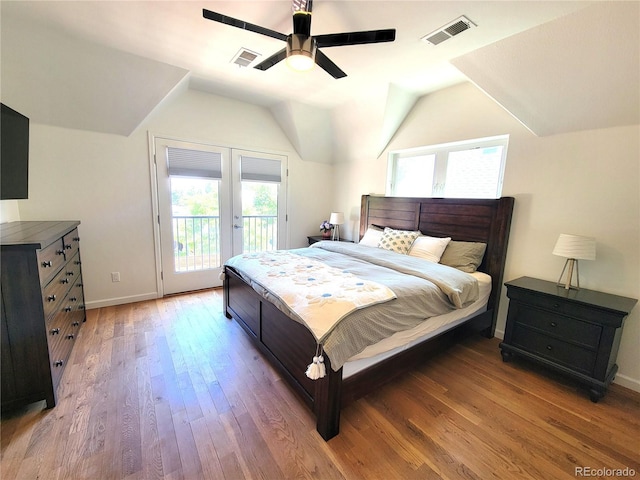 4348 Umatilla St, Denver, CO 80211 - bedroom with access to exterior, multiple windows, wood finished floors, lofted ceiling, and ceiling fan