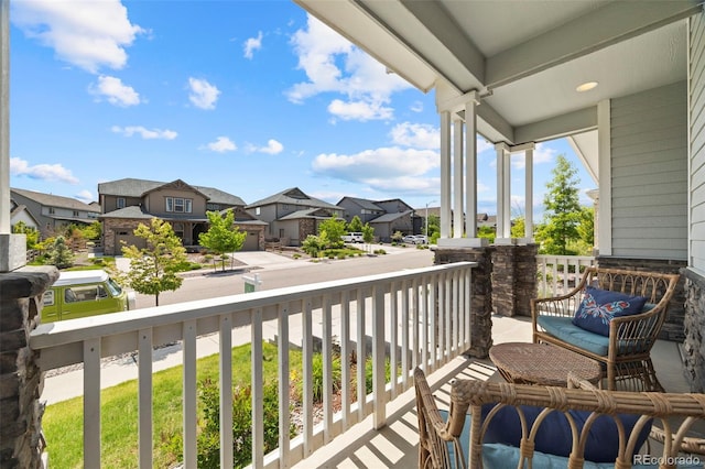 8261 Garden City Ave, Littleton, CO 80125 - porch featuring a residential view