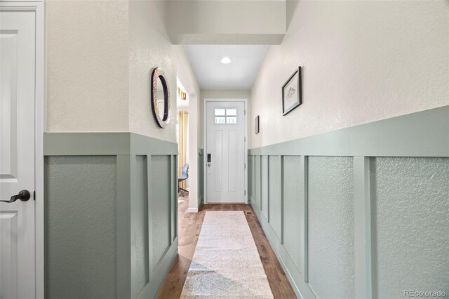 8261 Garden City Ave, Littleton, CO 80125 - entryway featuring dark wood-type flooring, a textured wall, and recessed lighting
